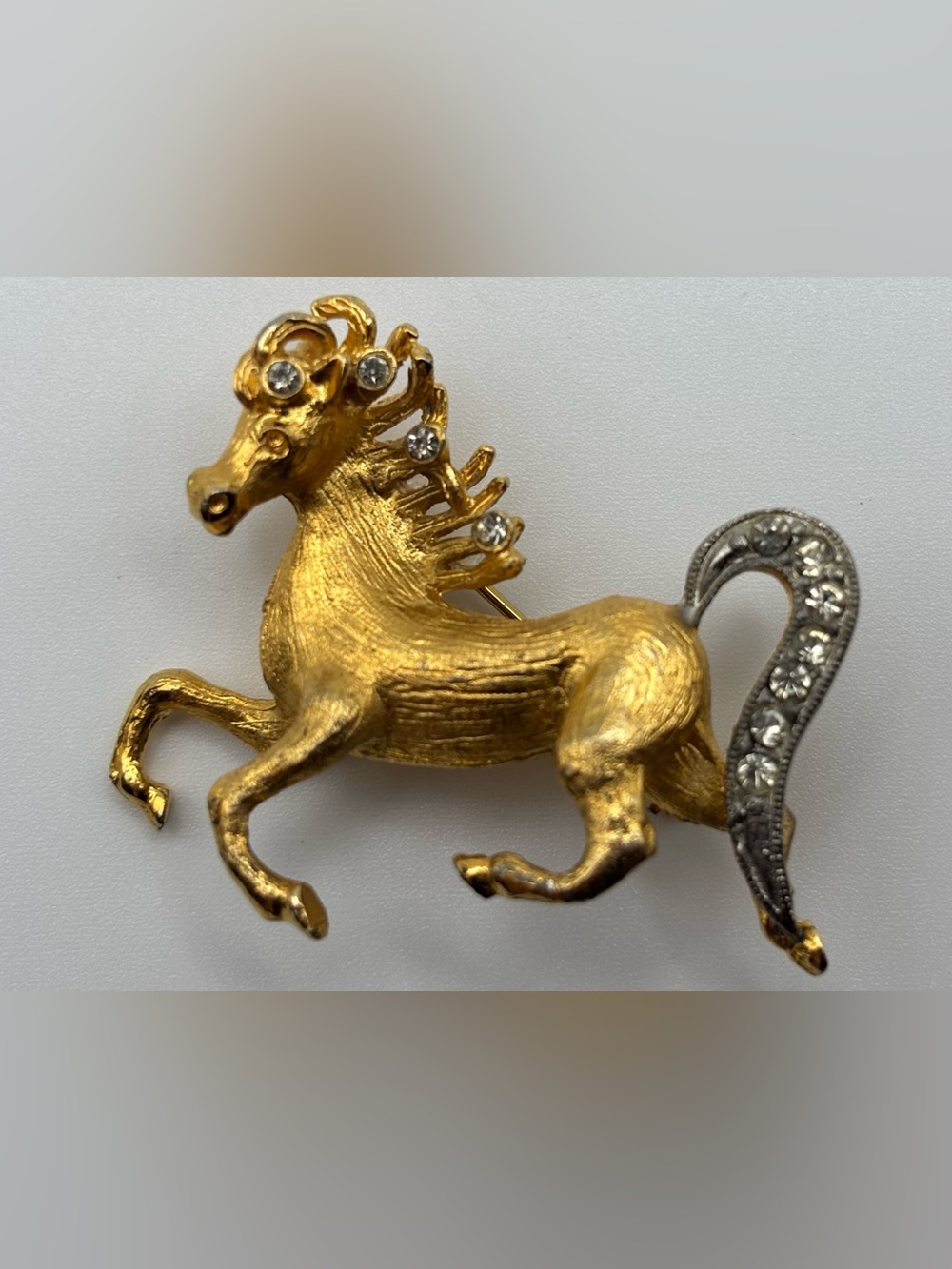 Vintage OB & Co Gold Tone Galloping Horse Brooch With Clear Rhinestones